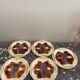 5 assiettes en barbotine