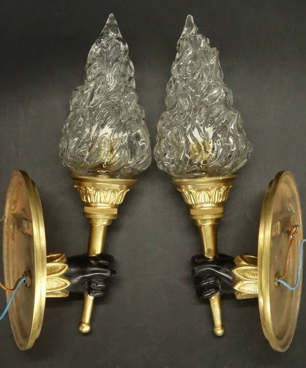 Pair of wall lights with hands in the style of John Devoluy - gilded bronze with black patina.