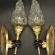 Pair of wall lights with hands in the style of John Devoluy - gilded bronze with black patina.