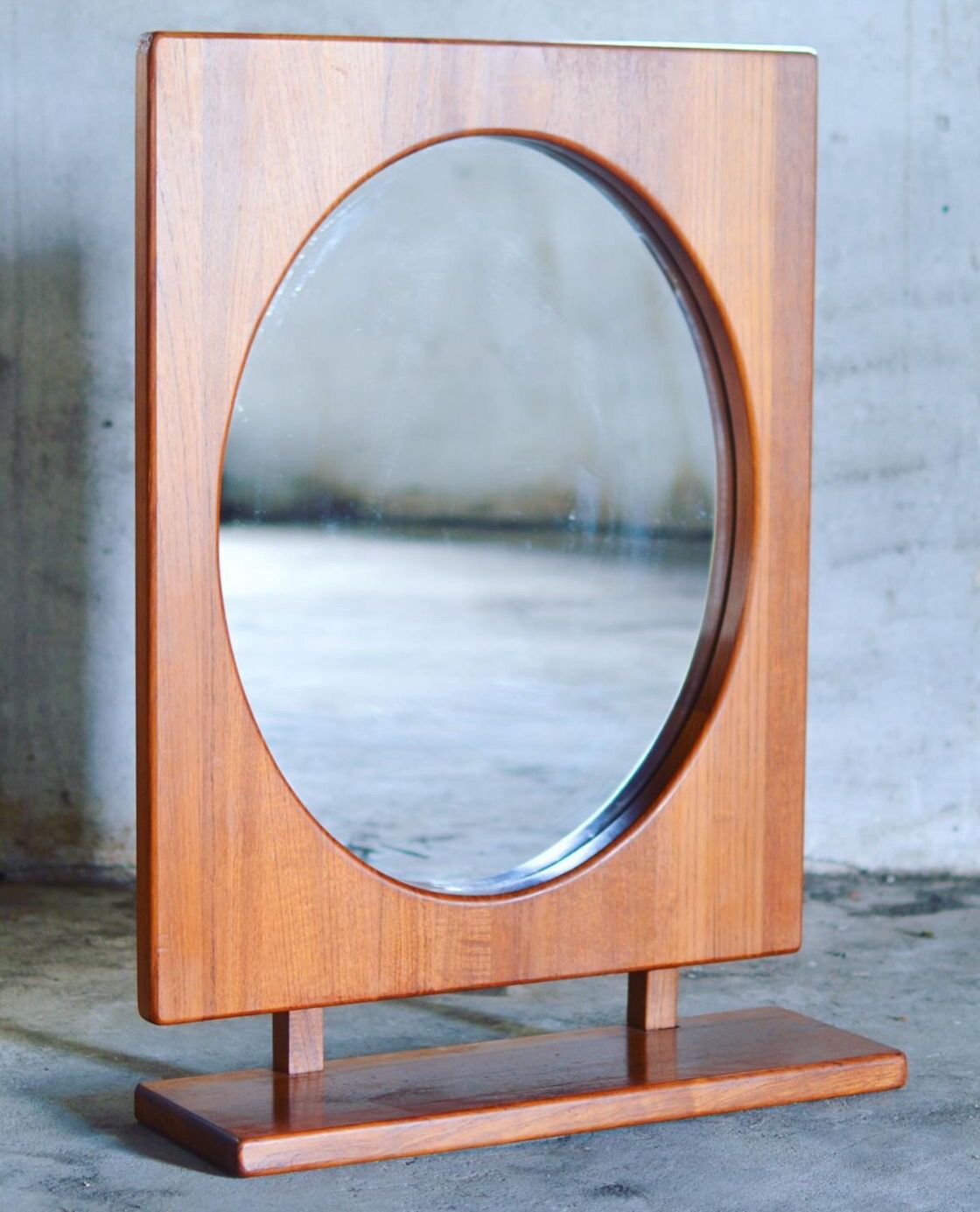 Round wall mirror with teak shelf by Pedersen & Hansen
