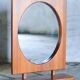 Round wall mirror with teak shelf by Pedersen & Hansen