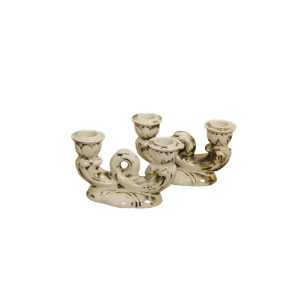 Set of two antique porcelain candle holders