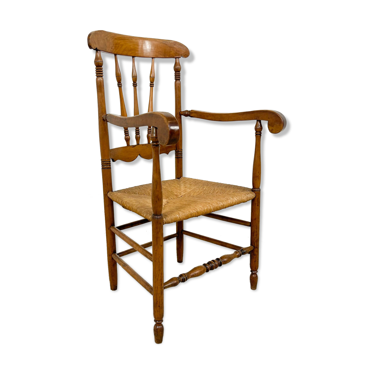 Antique oak and elm wooden armchair with cane seat