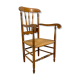 Antique oak and elm wooden armchair with cane seat