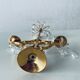 Candle holder with tassels