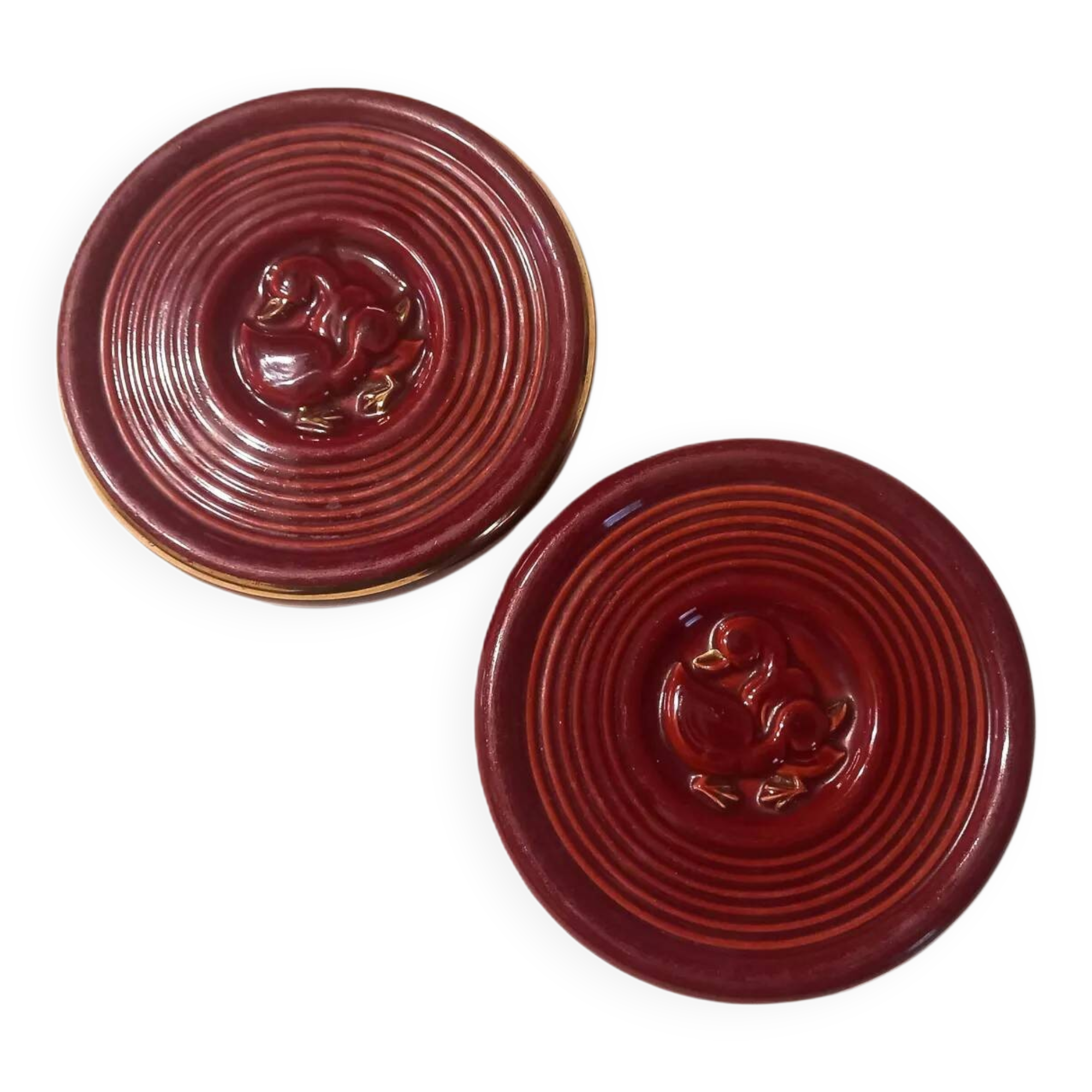 Pair of 1950s earthenware bottle coasters