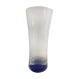 Glass roller vase with blue bubble background