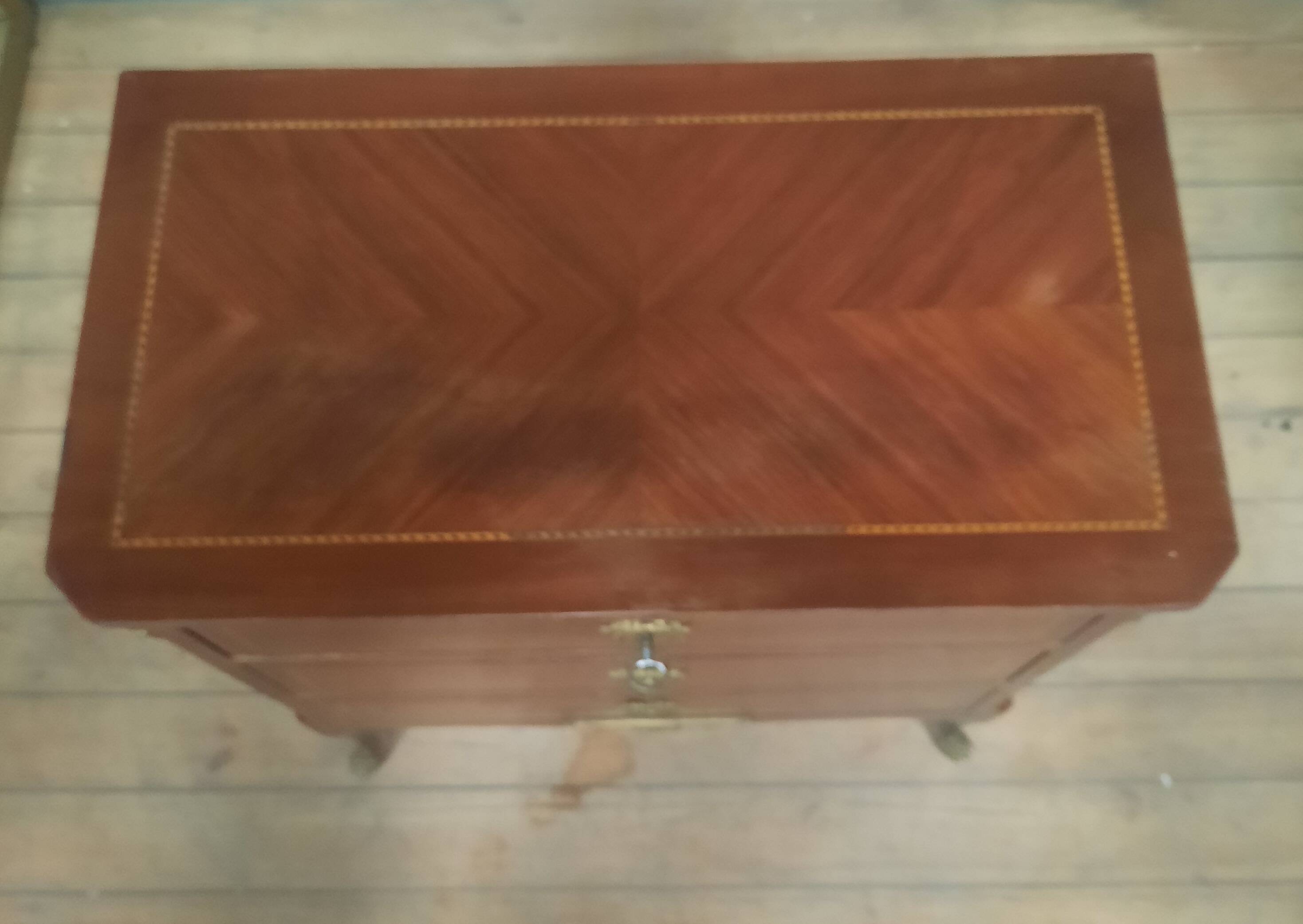 Small transitional style inlaid chest of drawers
