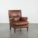 Fauteuil confortable en cuir de vache couleur cognac de style anglais