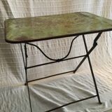 Folding riveted iron table