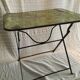 Folding riveted iron table