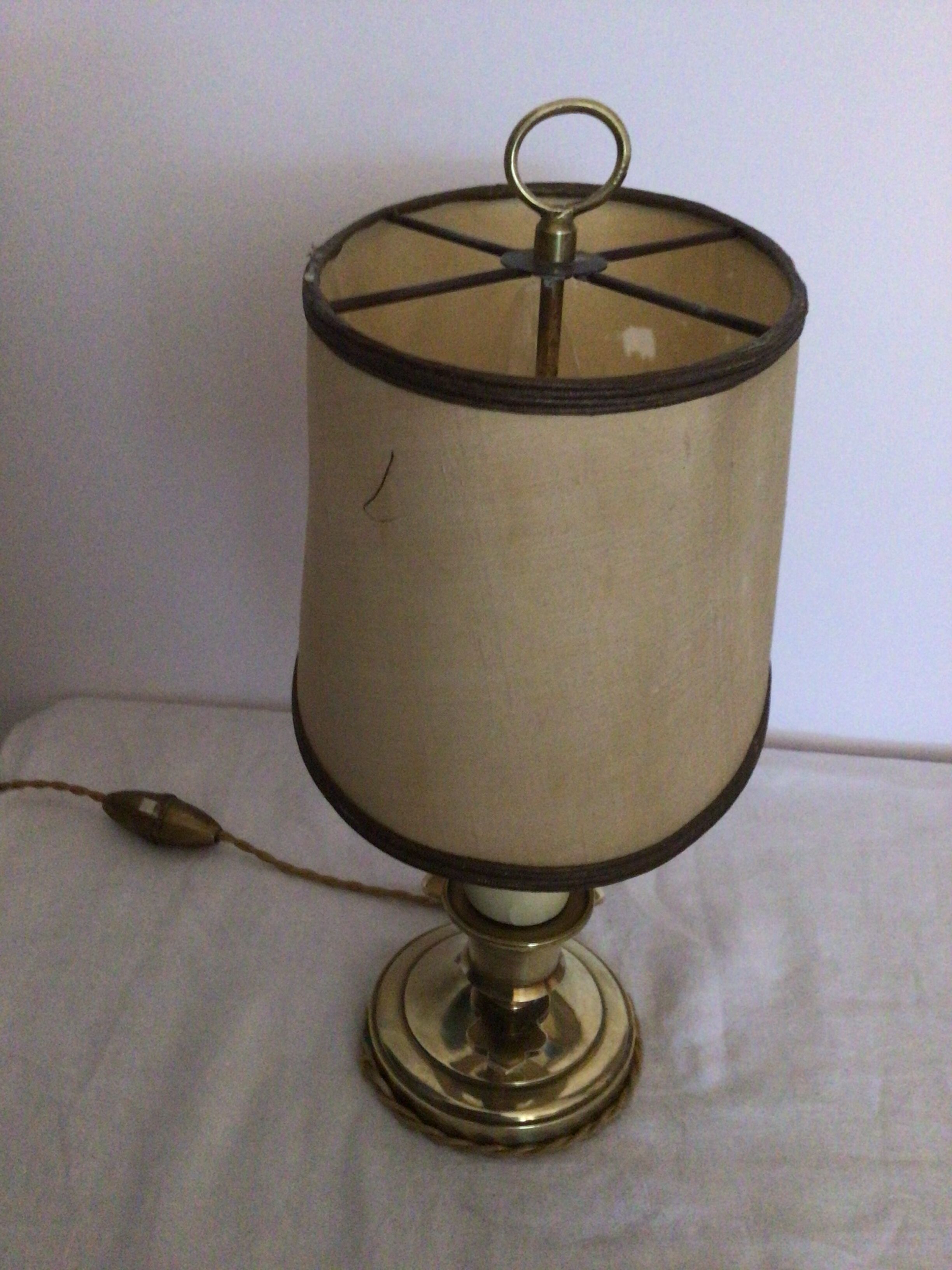 Old golden brass hot water bottle lamp with 2 arms of light