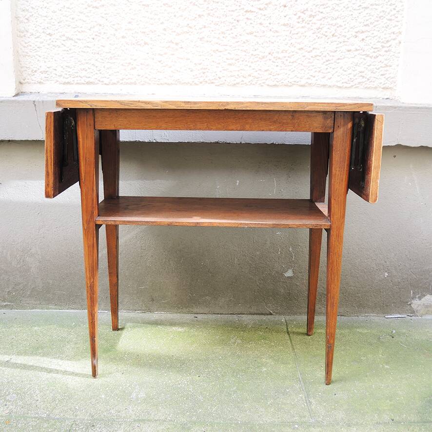 Old solid wood console with 2 flaps.
