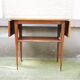 Old solid wood console with 2 flaps.