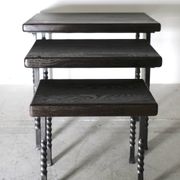 Brutalist nesting table in ebonized oak and wrought iron