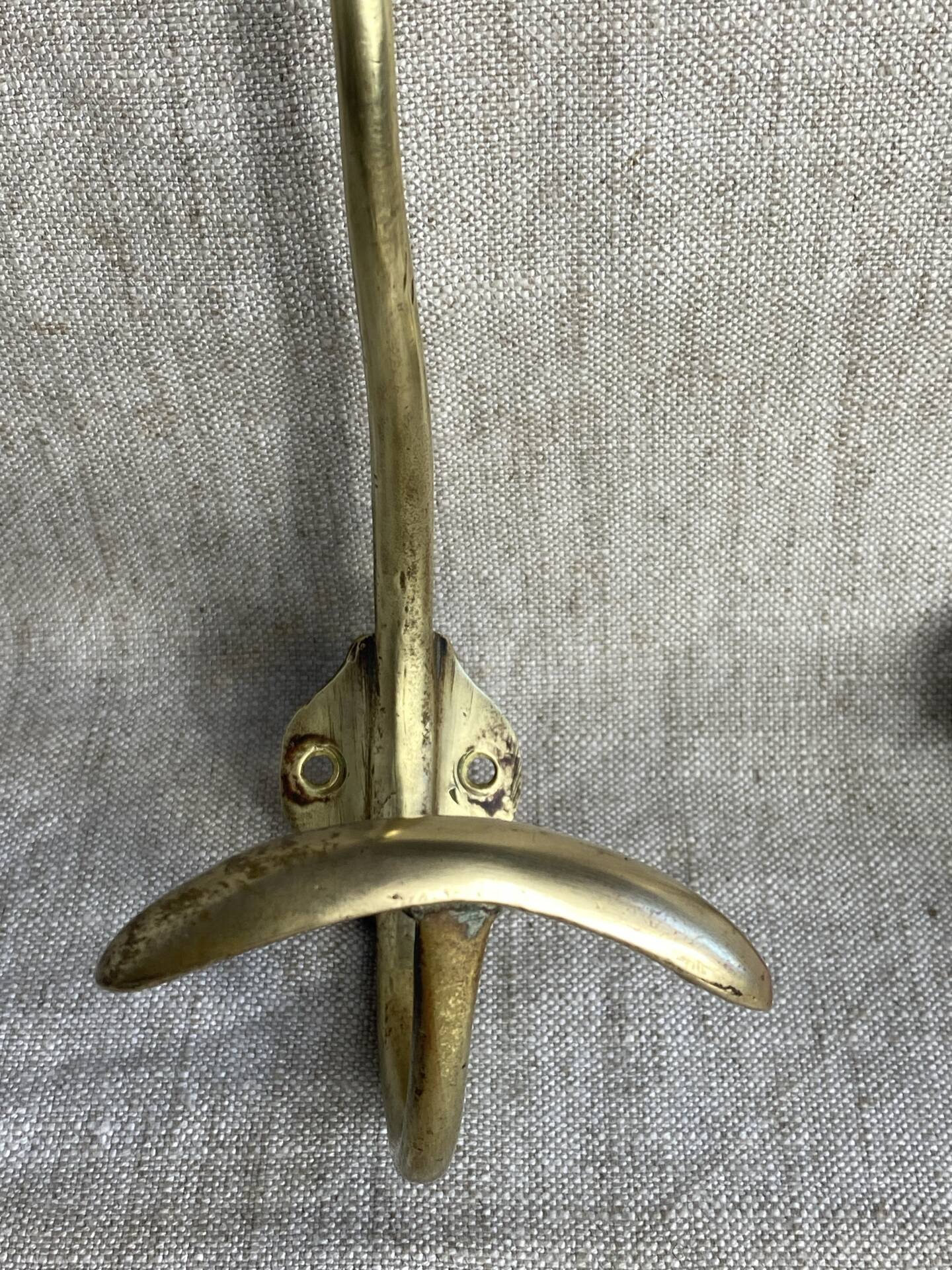 Pair of ball and hook coat hooks in brass