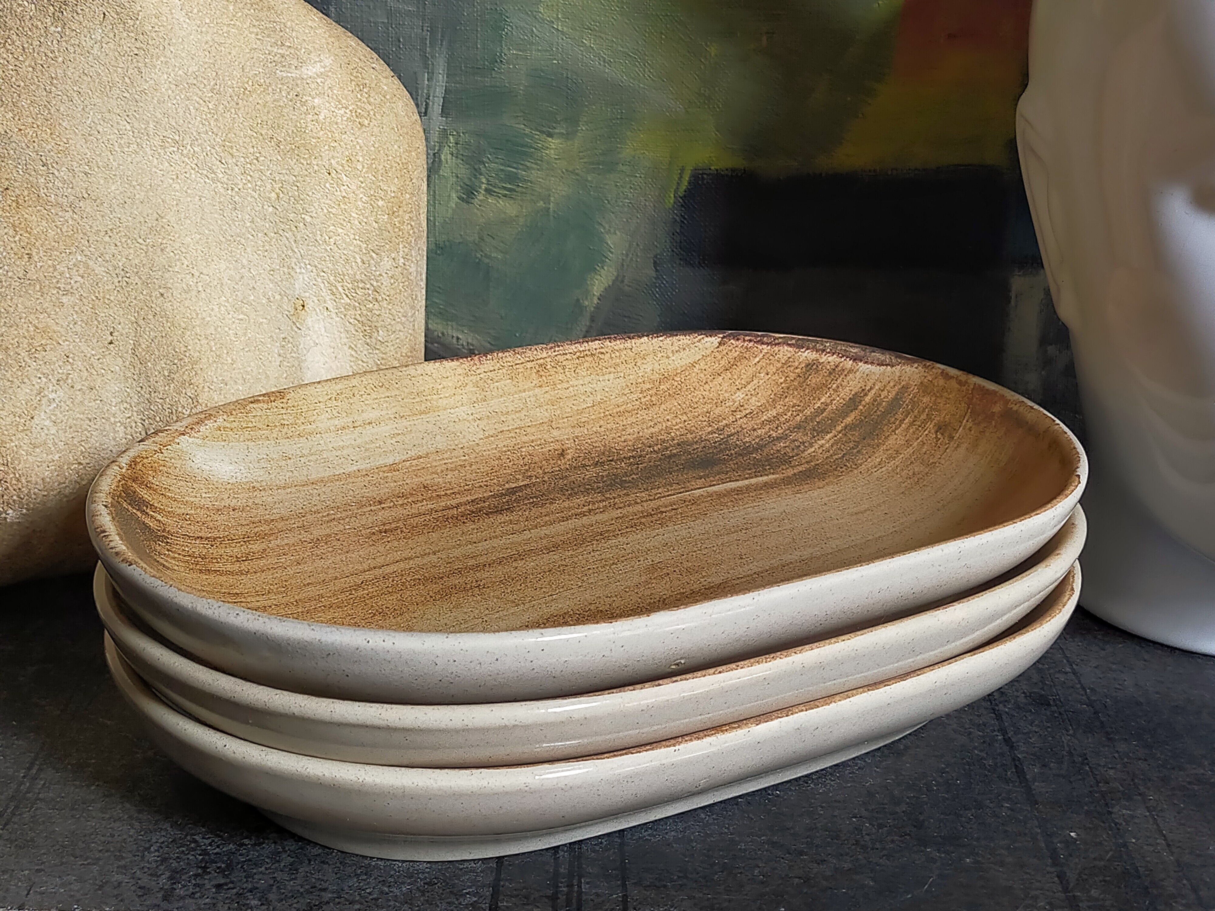 Three ceramic raviers decorated with vintage brushstrokes