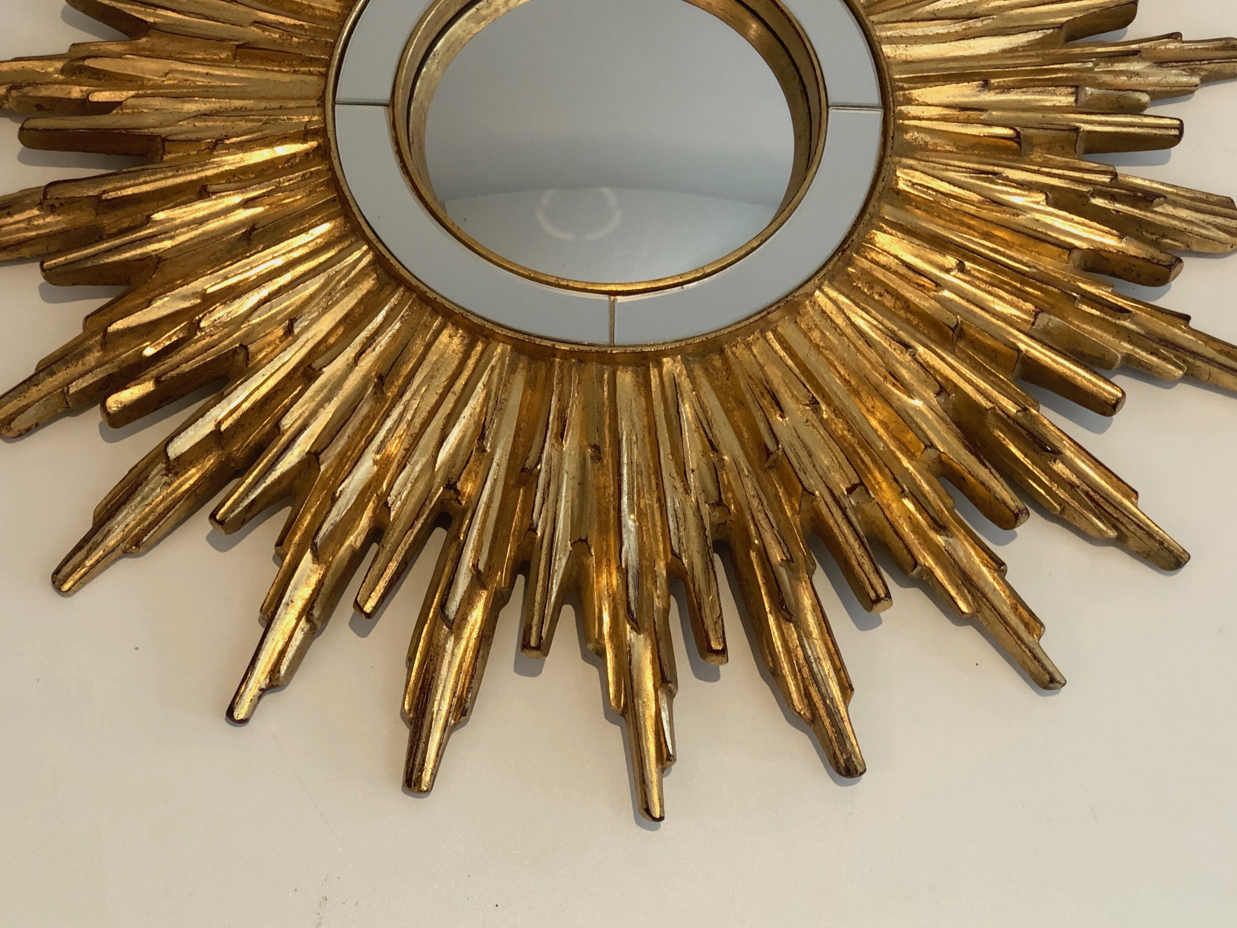 Sun mirror in golden resin 50cm