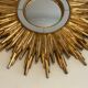 Sun mirror in golden resin 50cm