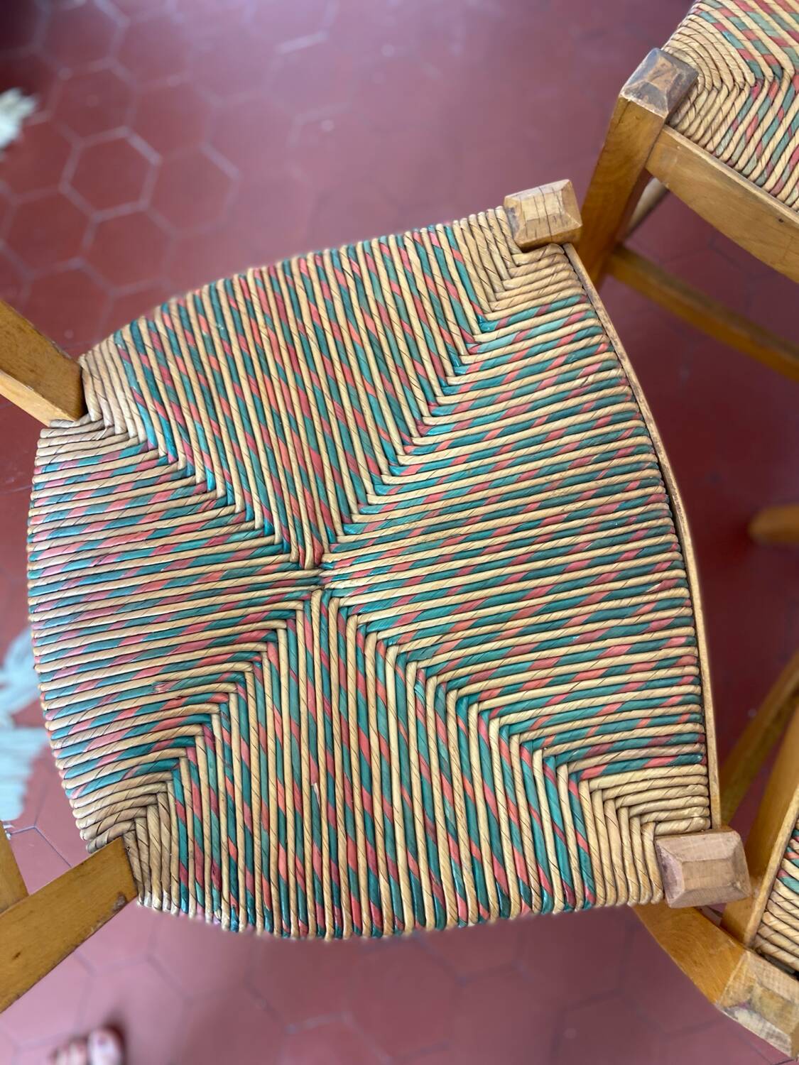 Trio of vintage straw/colored chairs
