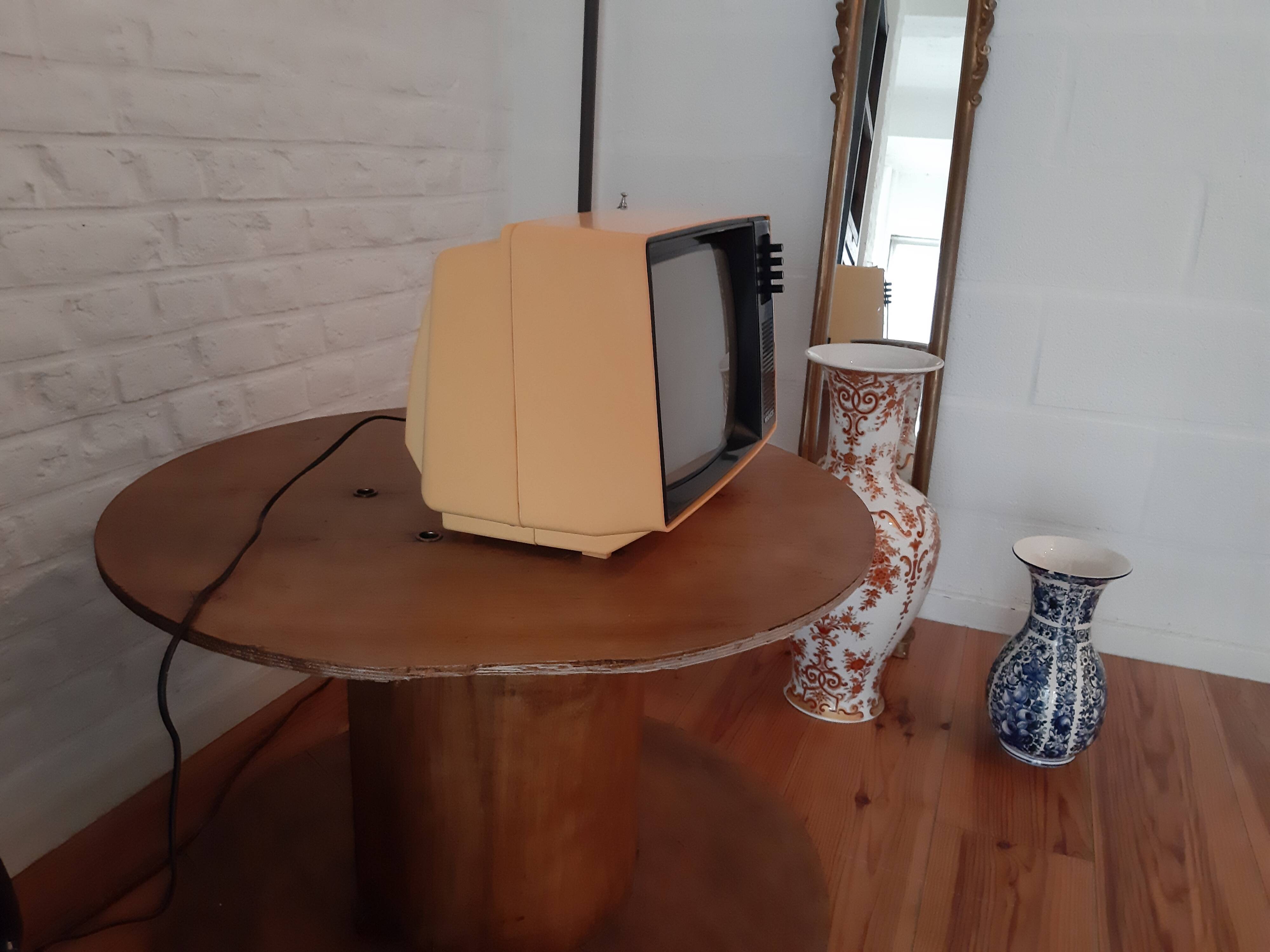 Yellow minivox vintage tv