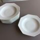 8 white hollow plates in Limoges porcelain
