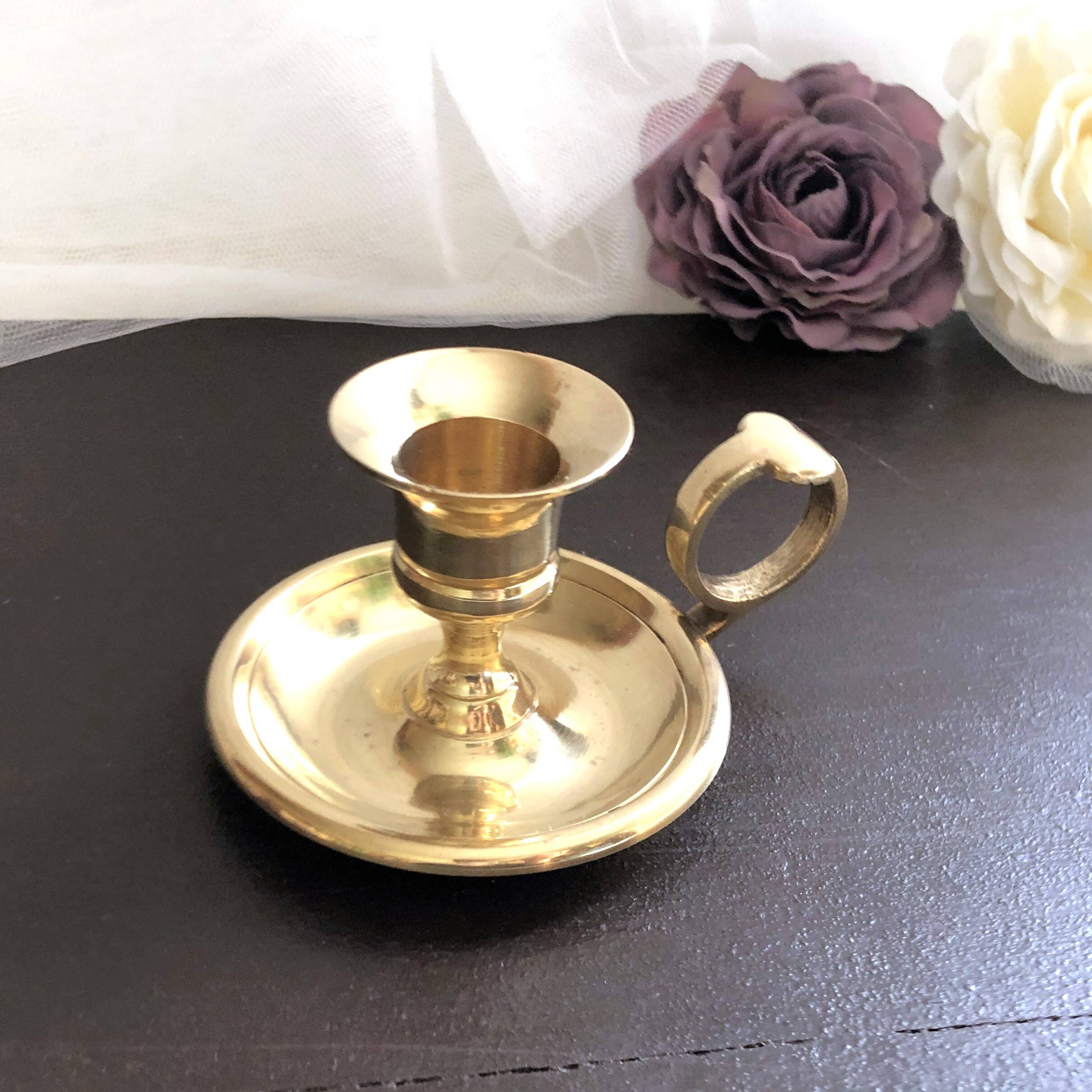 Hand candle holder called "Cave Rat" vintage golden brass