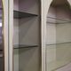 Showcases in lacquered wood, glass and brass  1970s, set of 4