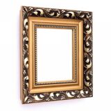 Unique mirror in gold frame.