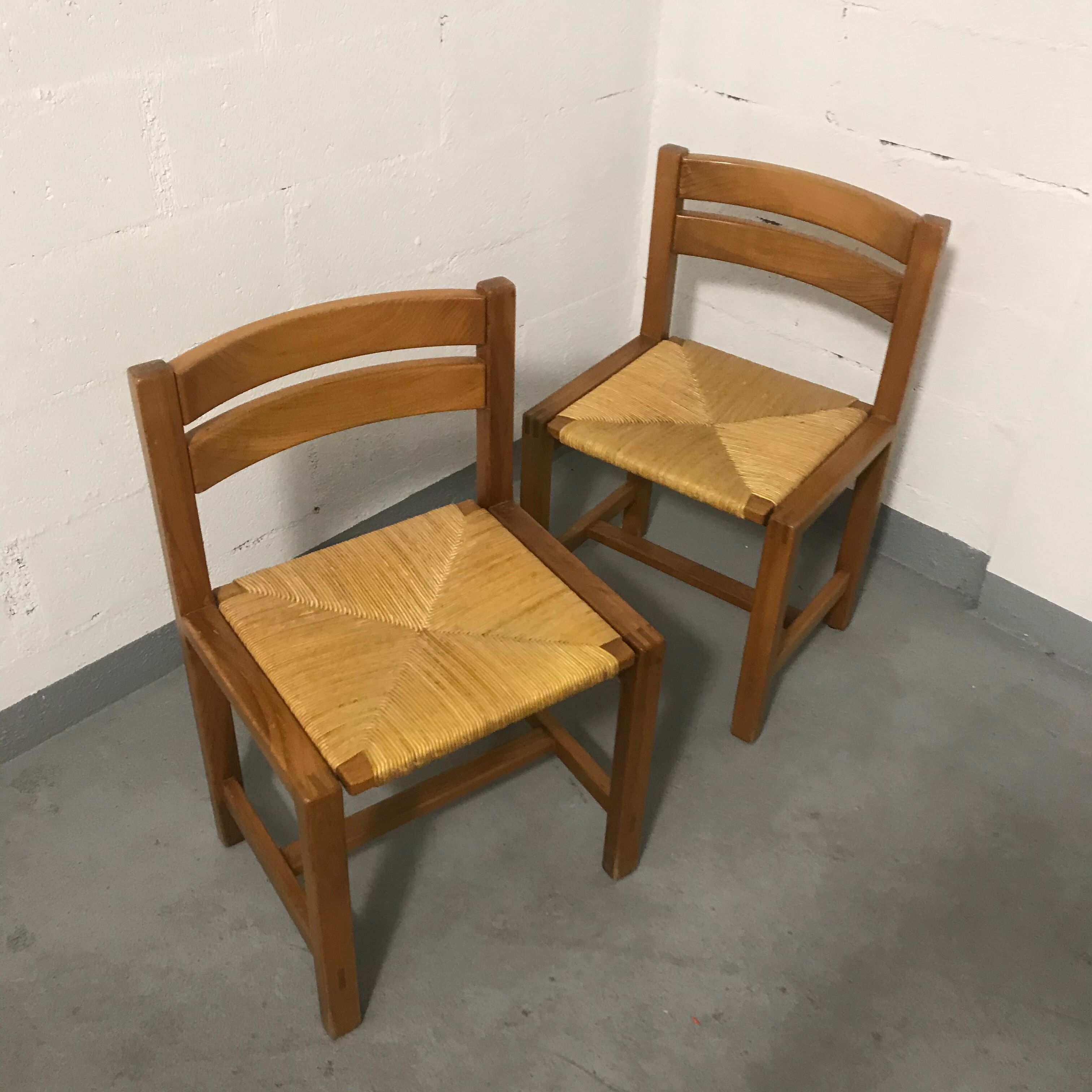 Maison Regain pair of chairs apparent assemblages mulched seating.