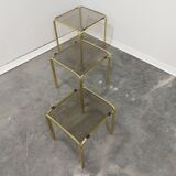 Brass and smoked glass nesting tables, 1970s