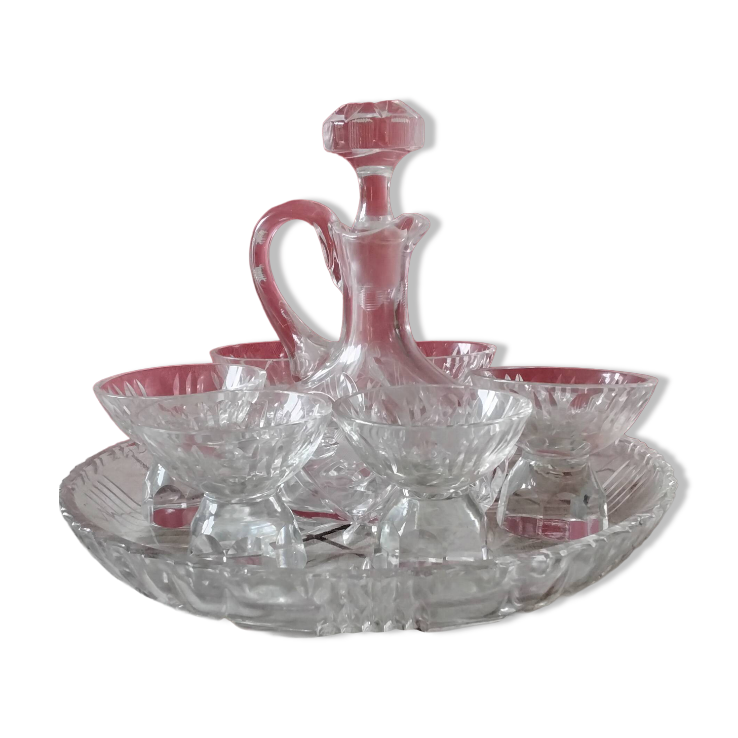 Service 1 carafe, 6 glasses and 1 tray in crystal.