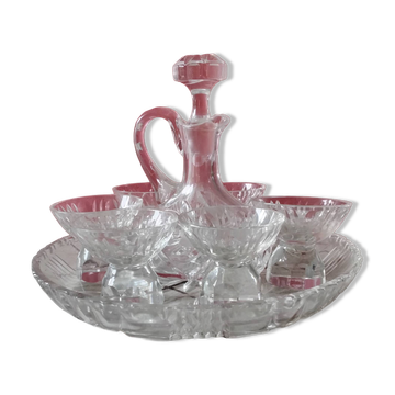 Service 1 carafe, 6 glasses and 1 tray in crystal.