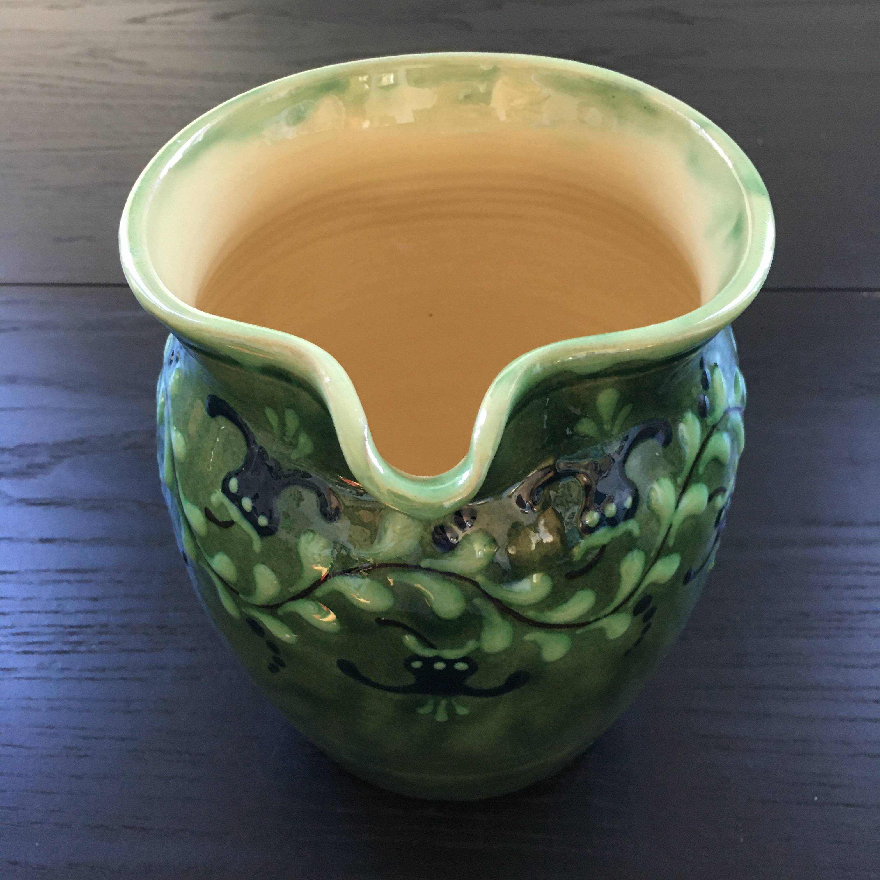 Large pitcher with floral decoration