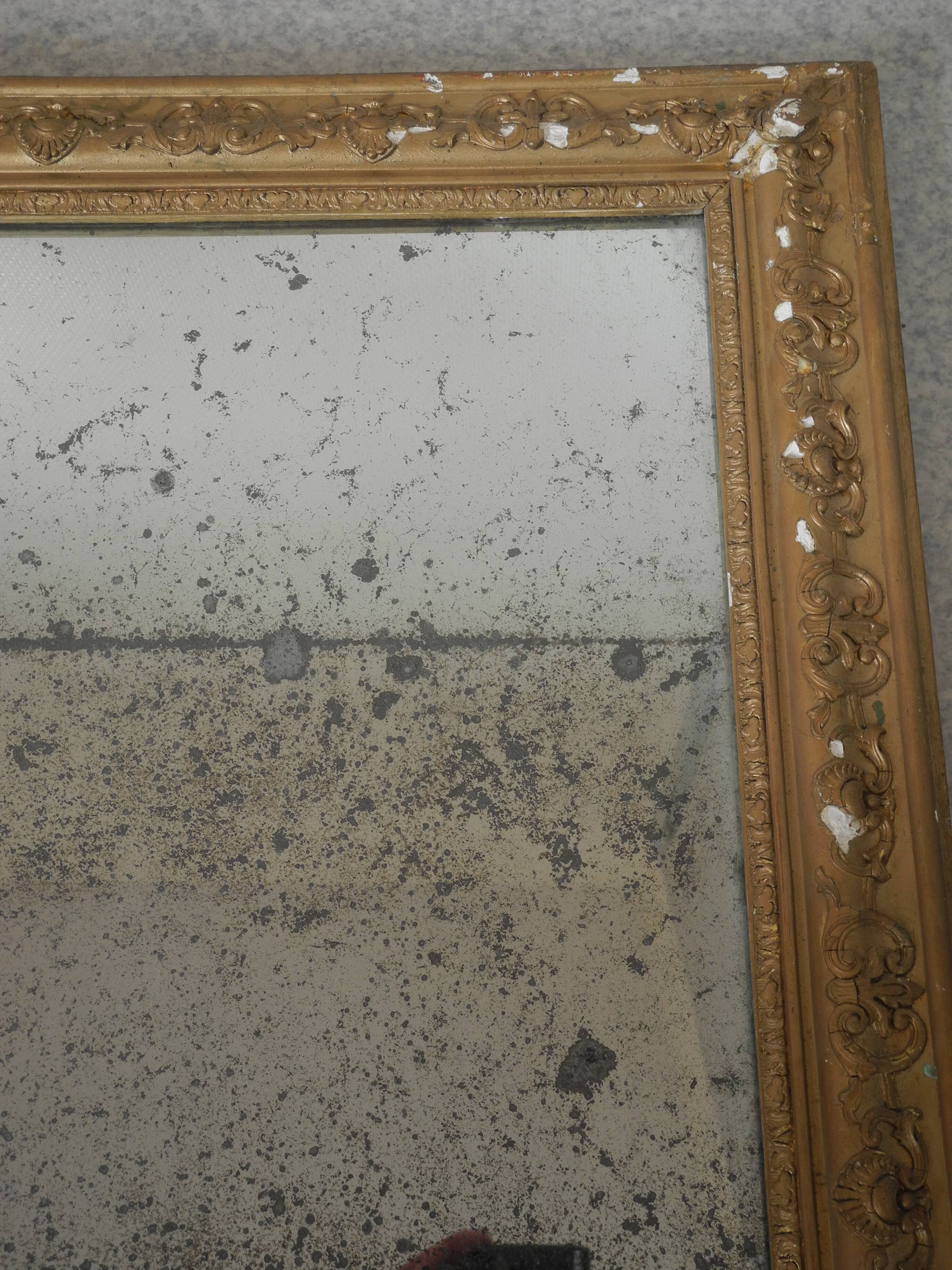antique mercury mirror with gilded wood and stucco from the 19th century