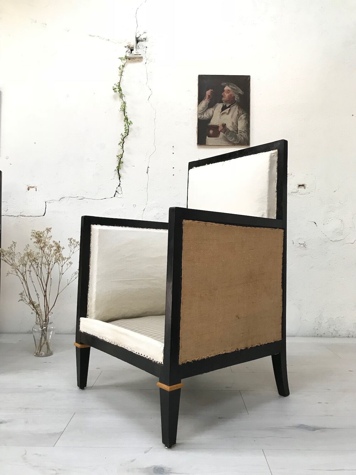 Pair of blackened wooden armchairs