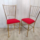 Duo of vintage gold metal chairs