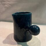 Blue ceramic milk jug