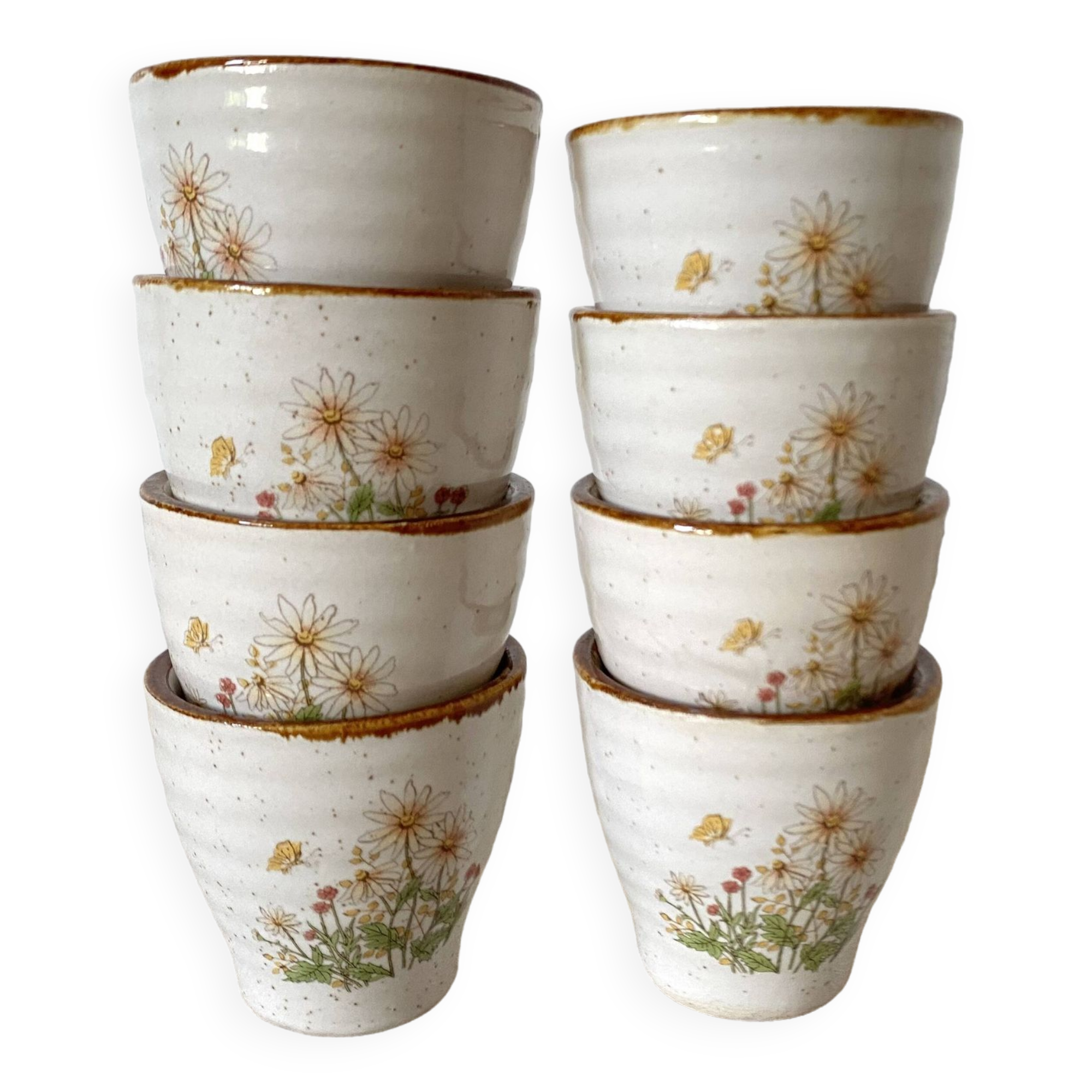 Stoneware egg cups, floral decoration