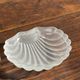 Vintage silver-plated shell butter dish with transparent bowl.