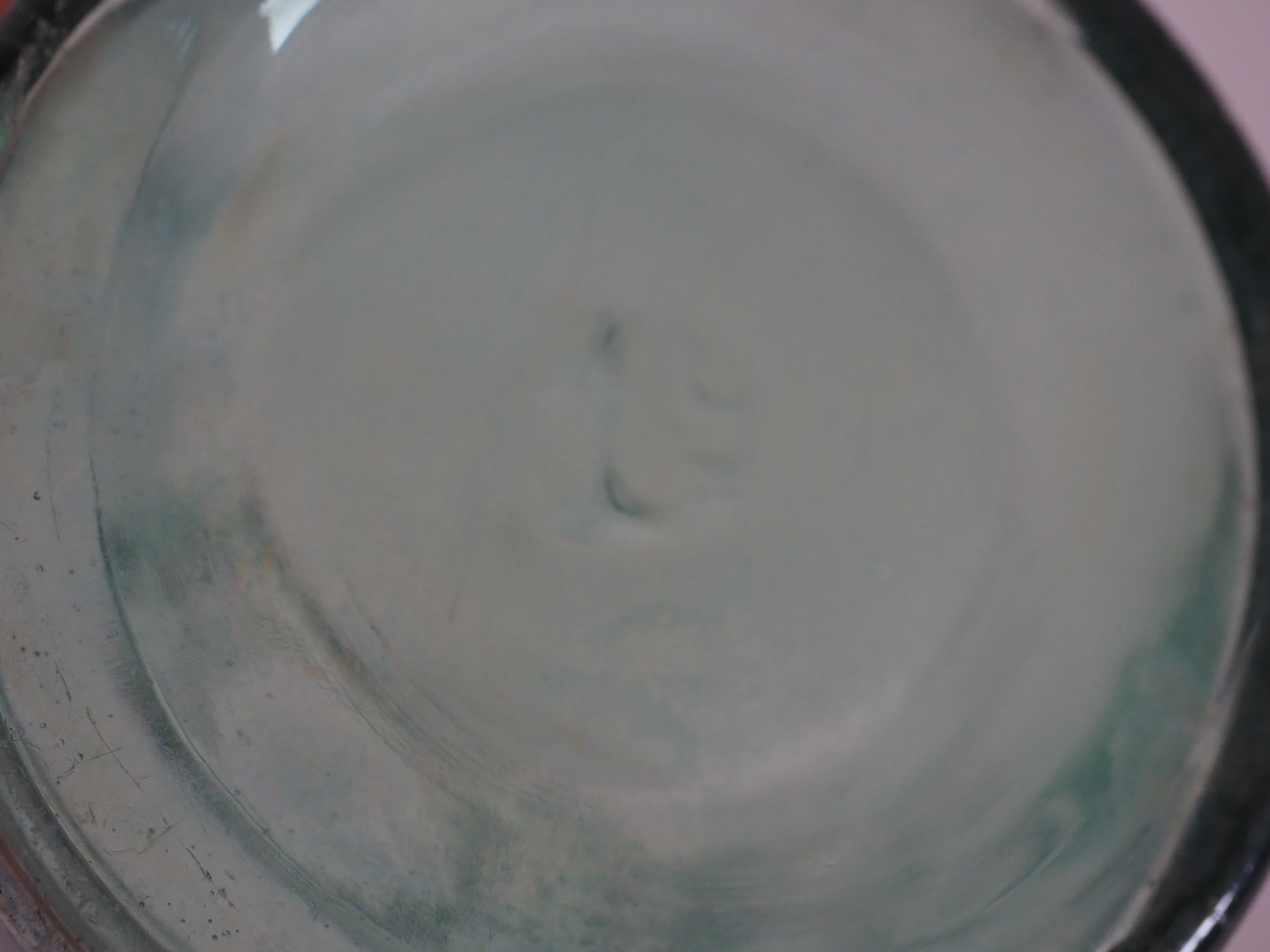 Green "ideale" glass canning jar