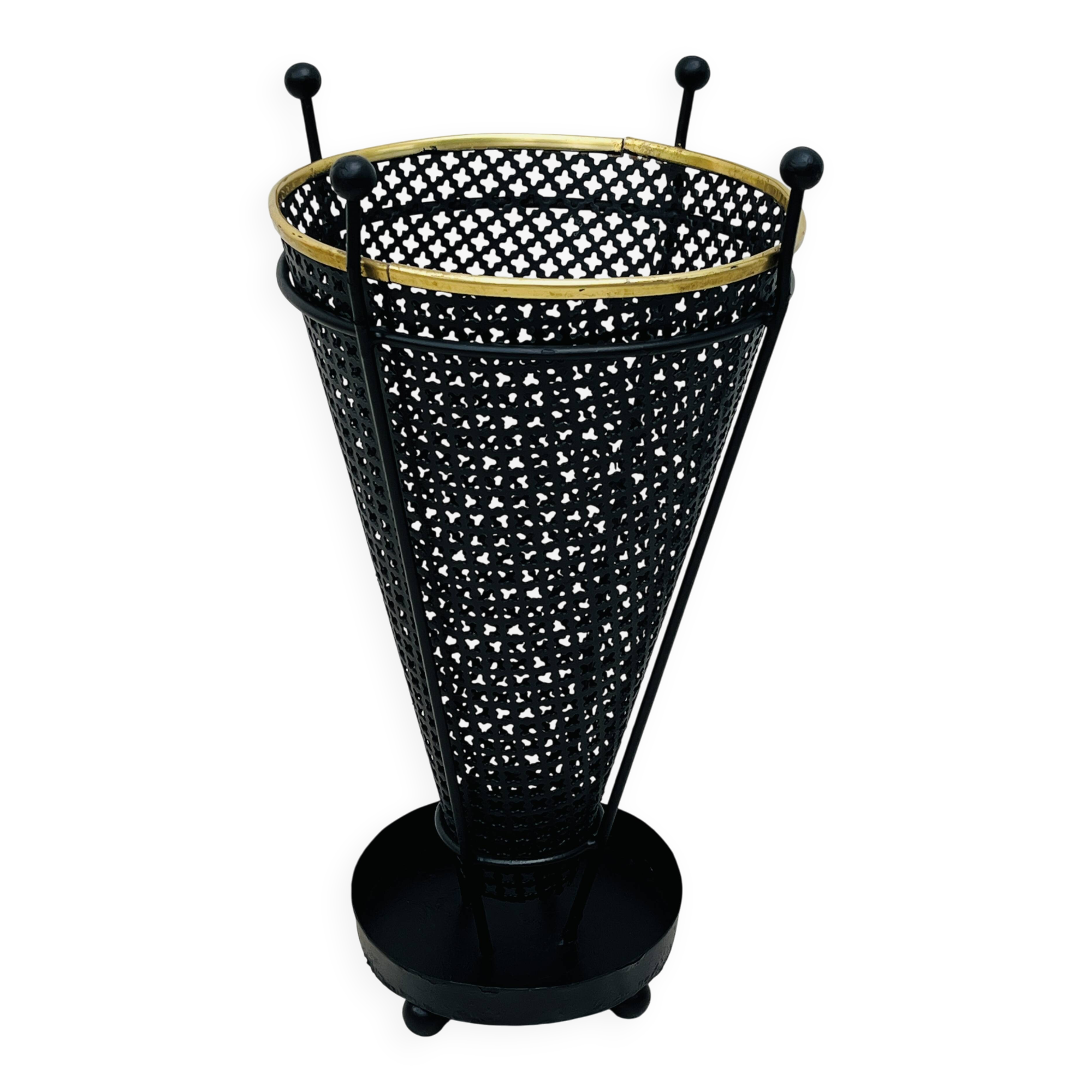 Vintage black perforated metal and brass umbrella stand