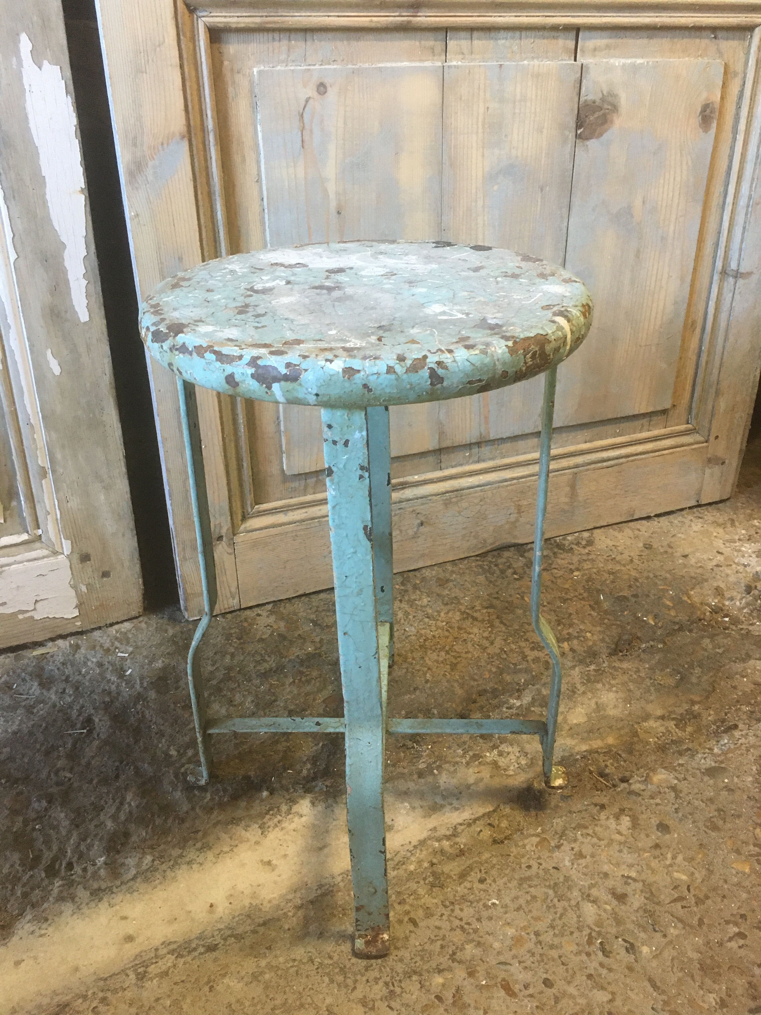 Patinated metal industrial stool