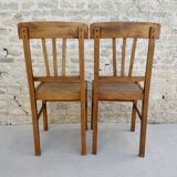 Pair of bistro chairs with perforated seat