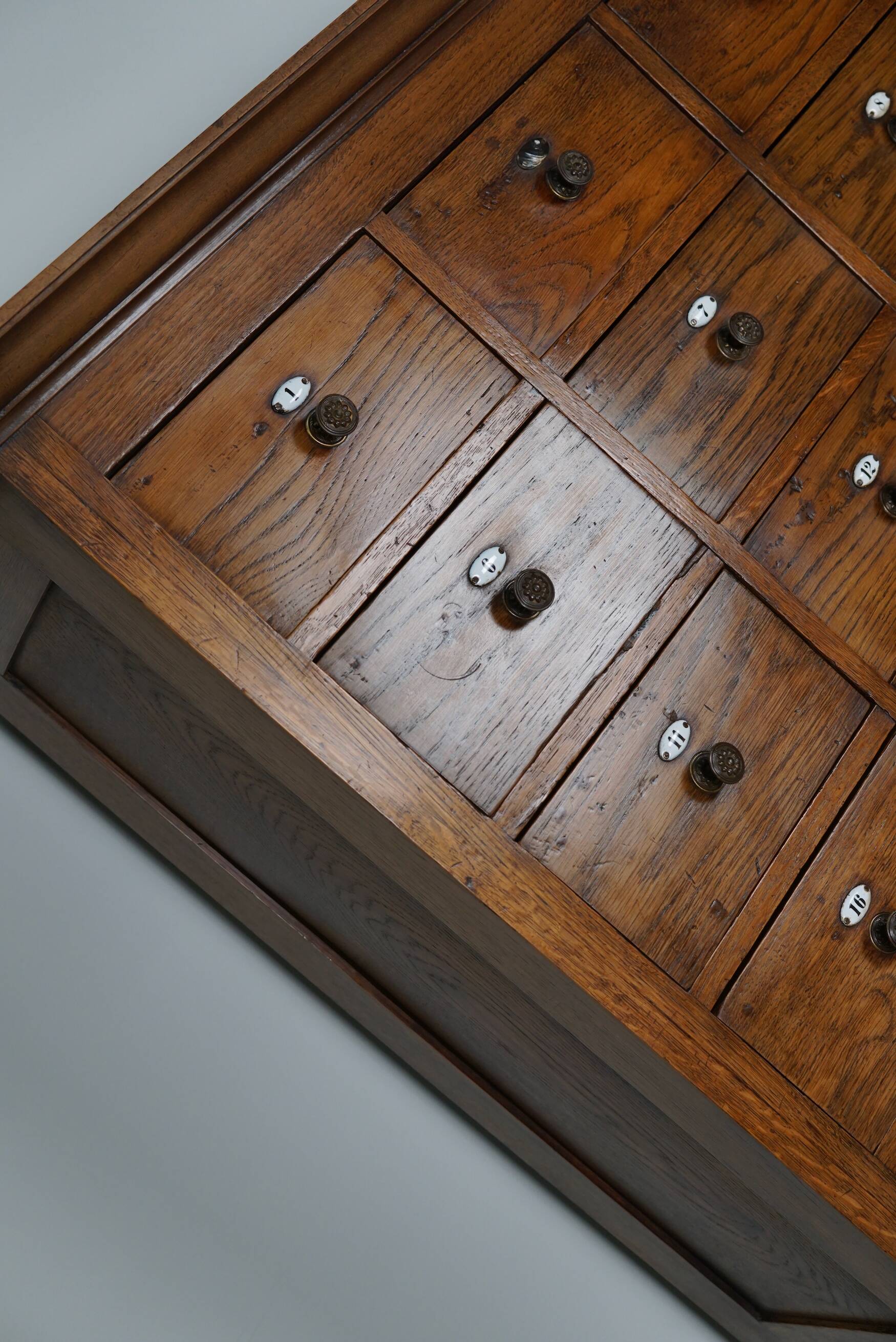 Large dutch oak apothecary cabinet / barber cabinet with enamel shields, 1900s
