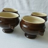 mini earthenware soup tureens in brown and beige inside.