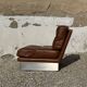 2 armchairs and 1 ottoman in brushed aluminium and brown leather, France, 1970.