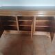 Low buffet in solid cherry wood, 3 doors, 3 drawers.