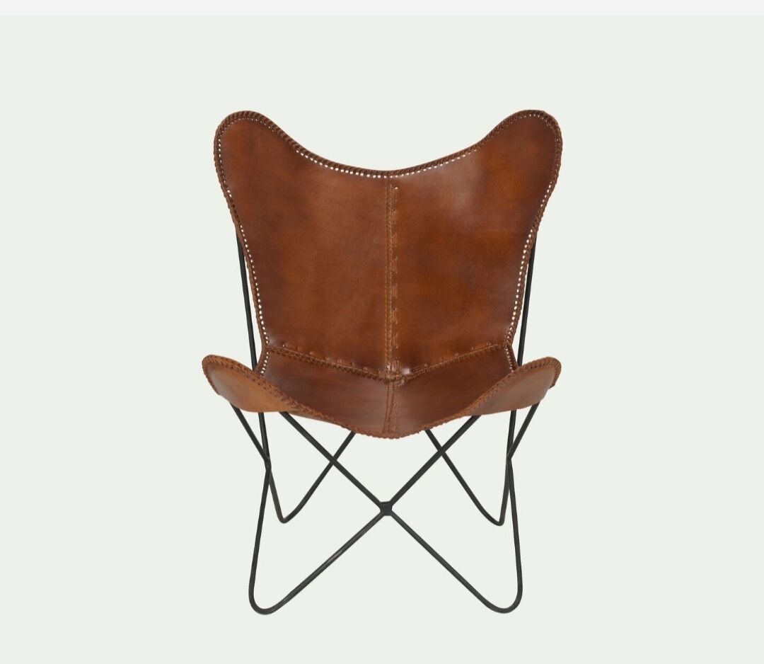 Butterfly armchair in cowhide crust