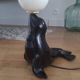 Vintage black sea lion lamp